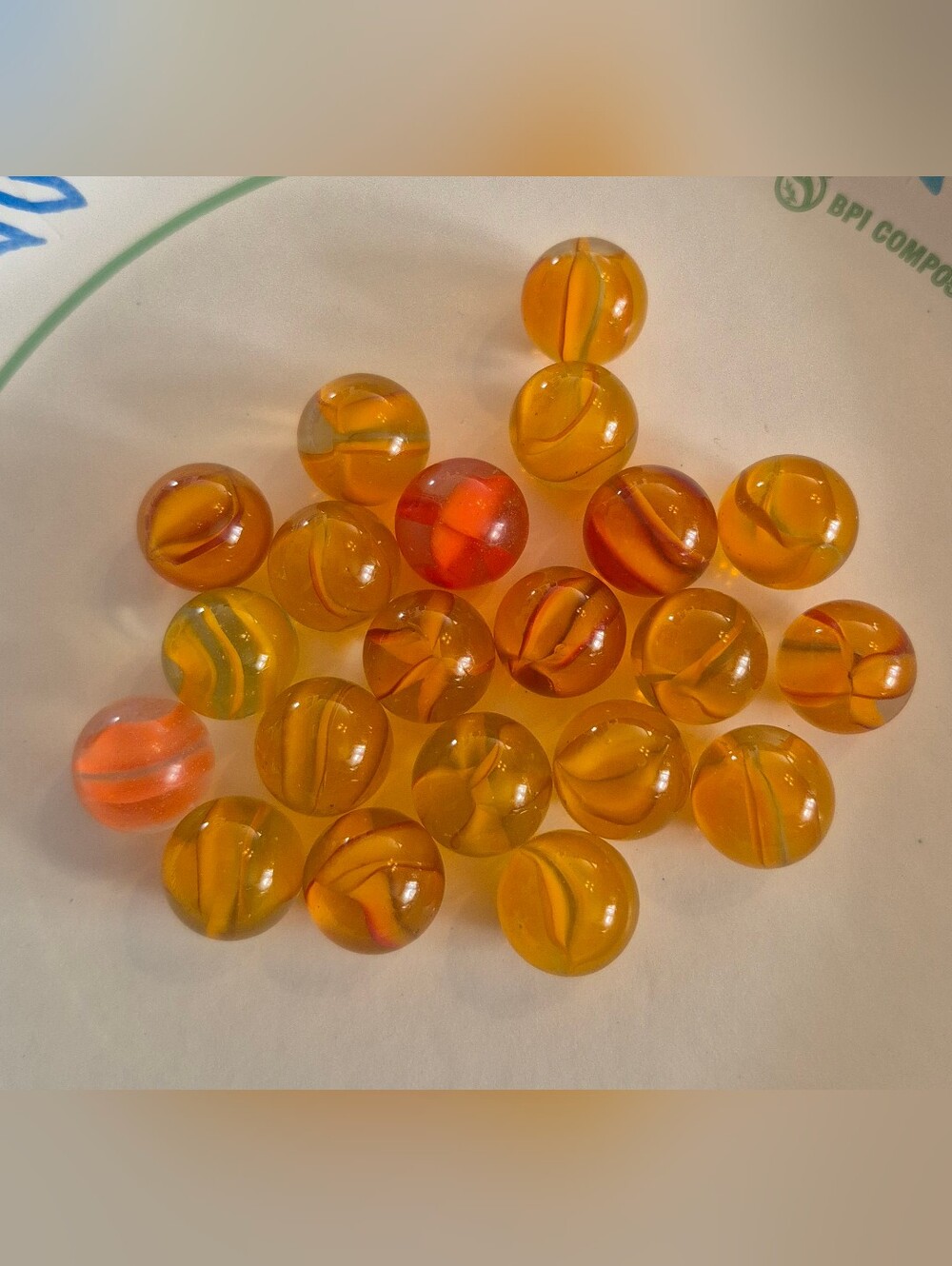 Lot of 21 Vintage Amber Orange Cat’s Eye Glass Marbles Mixed Swirl Shooter